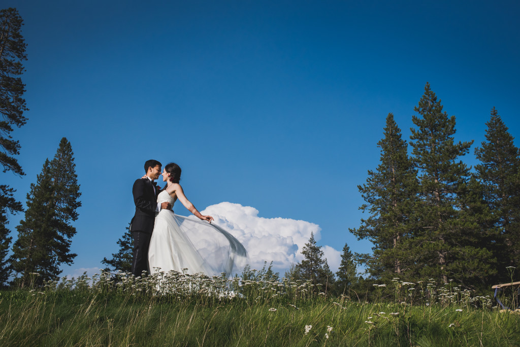 Romantic Lake Tahoe wedding photo of couple on hill