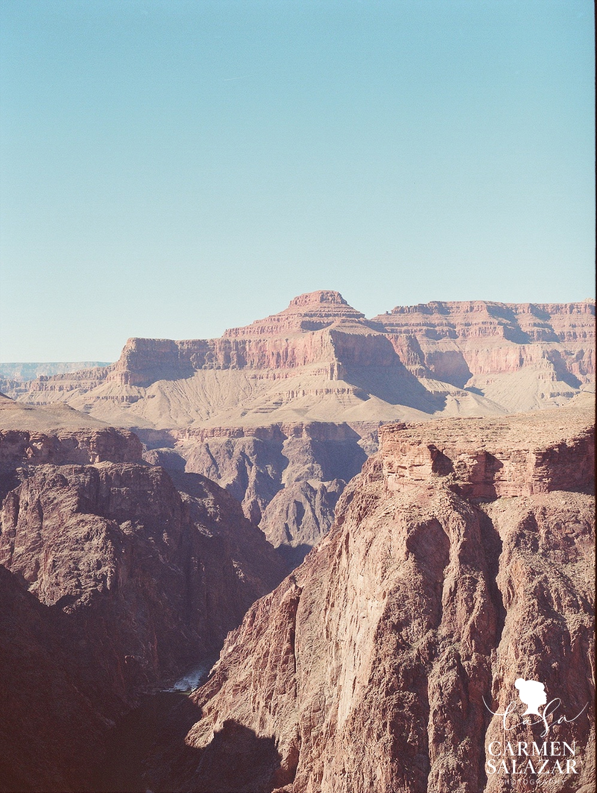 hiking at grand canyon with camera by Carmen Salazar