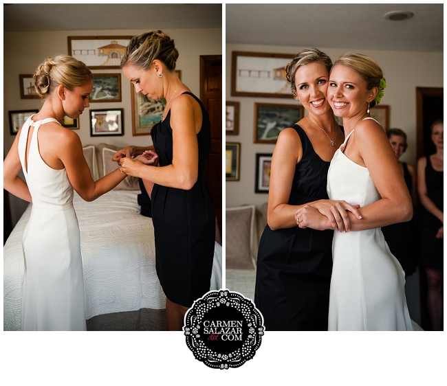 bridesmaid helping bride get ready