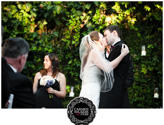 romantic colorful bride and groom kiss