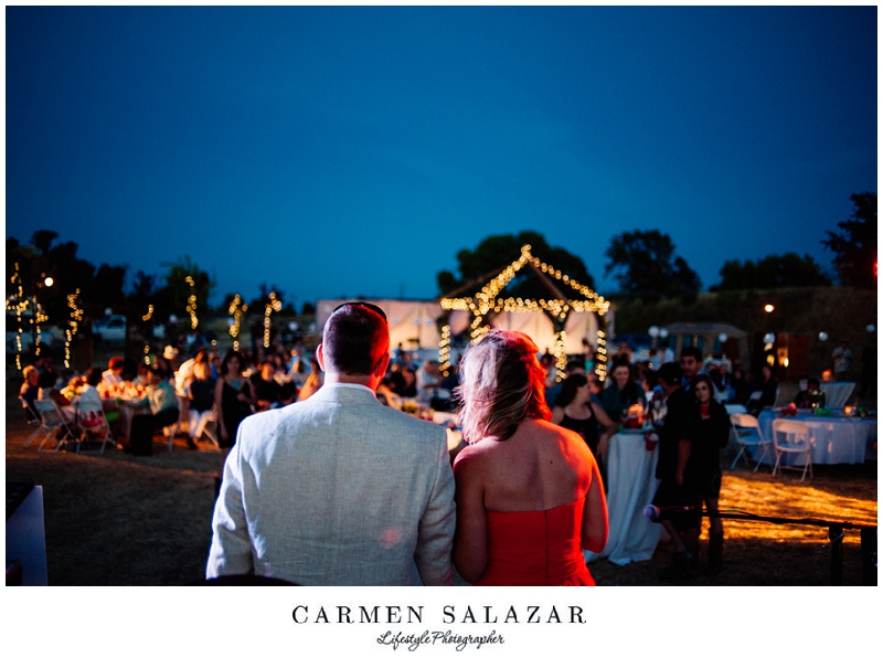 moonlit reception toasts at a Sacramento Outdoor Wedding