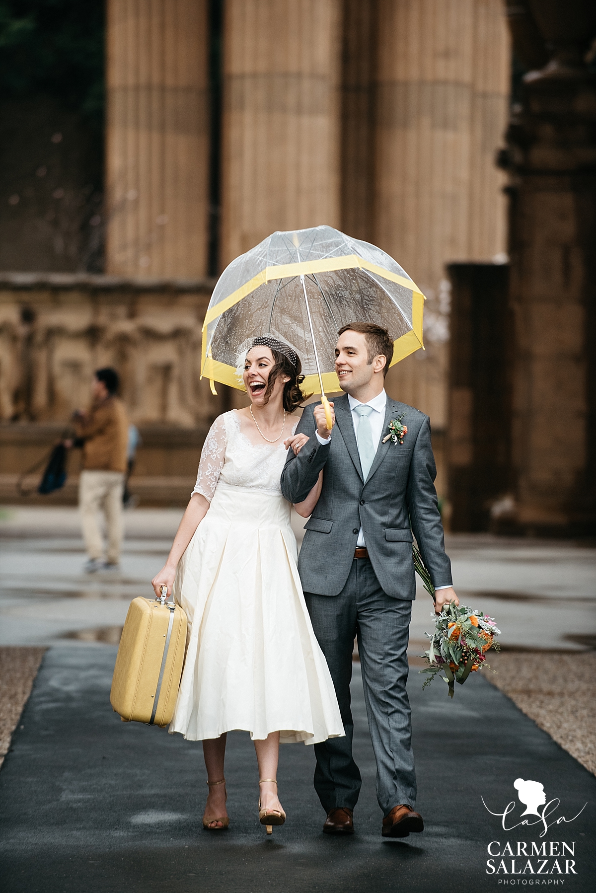 Newlyweds on Rainy Wedding Day 