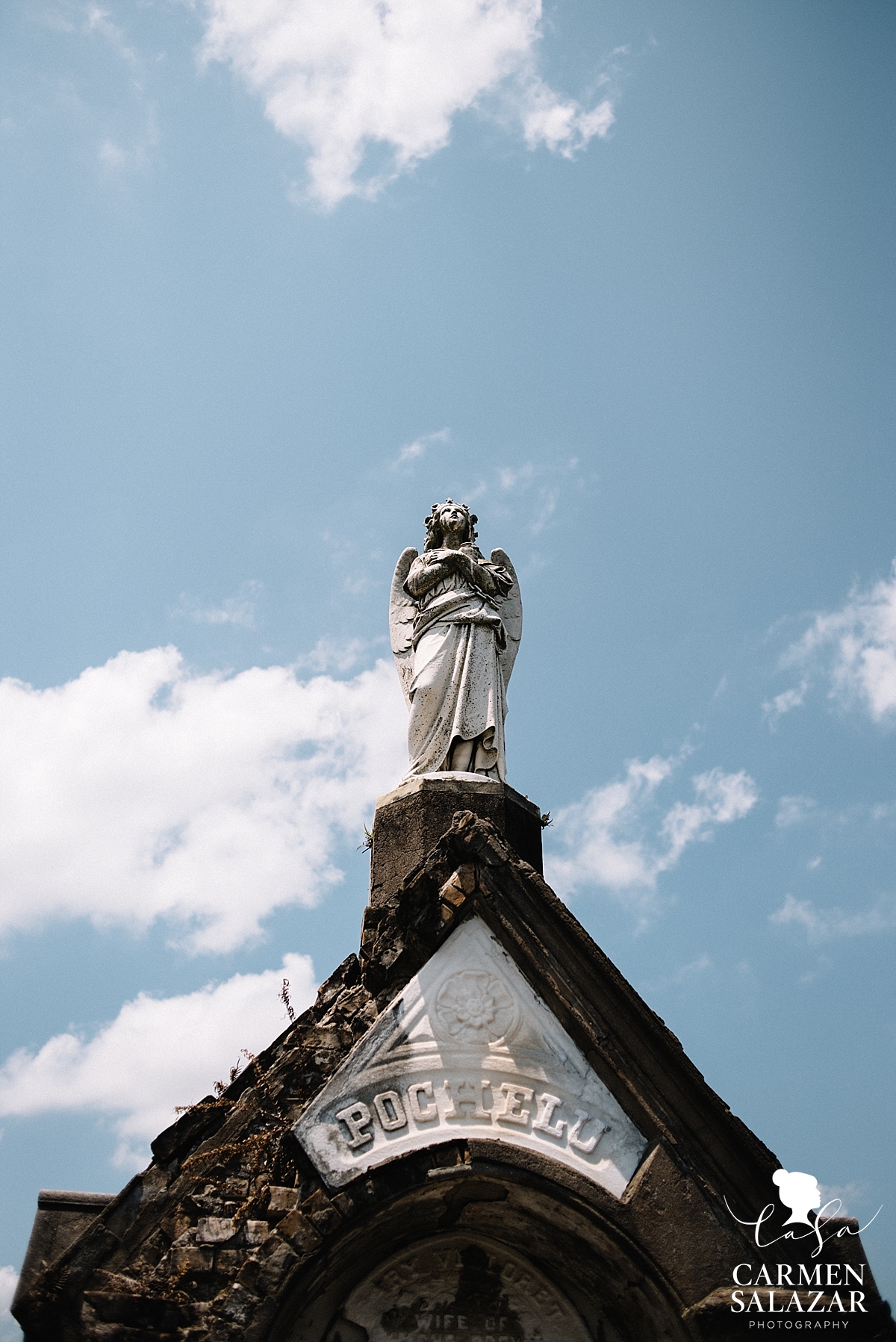 Mausoleum angel in New Orleans by Carmen Salazar