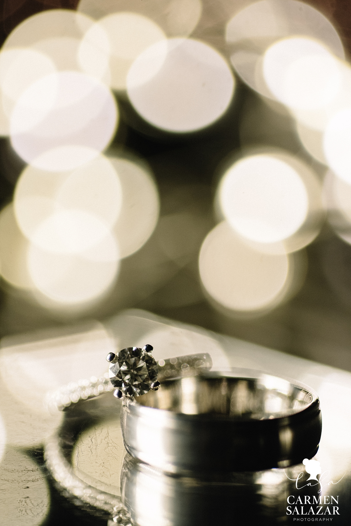 close up photo of wedding ring by Carmen Salazar