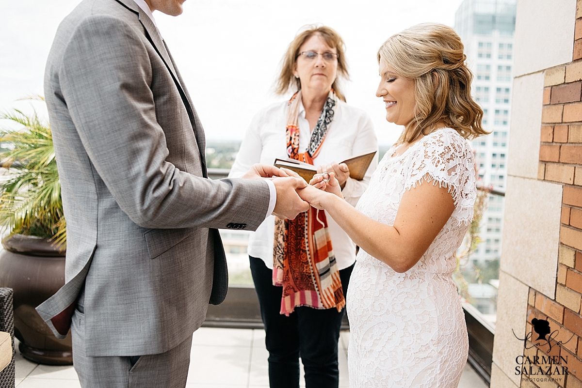 Bride and groom exchanging rings 