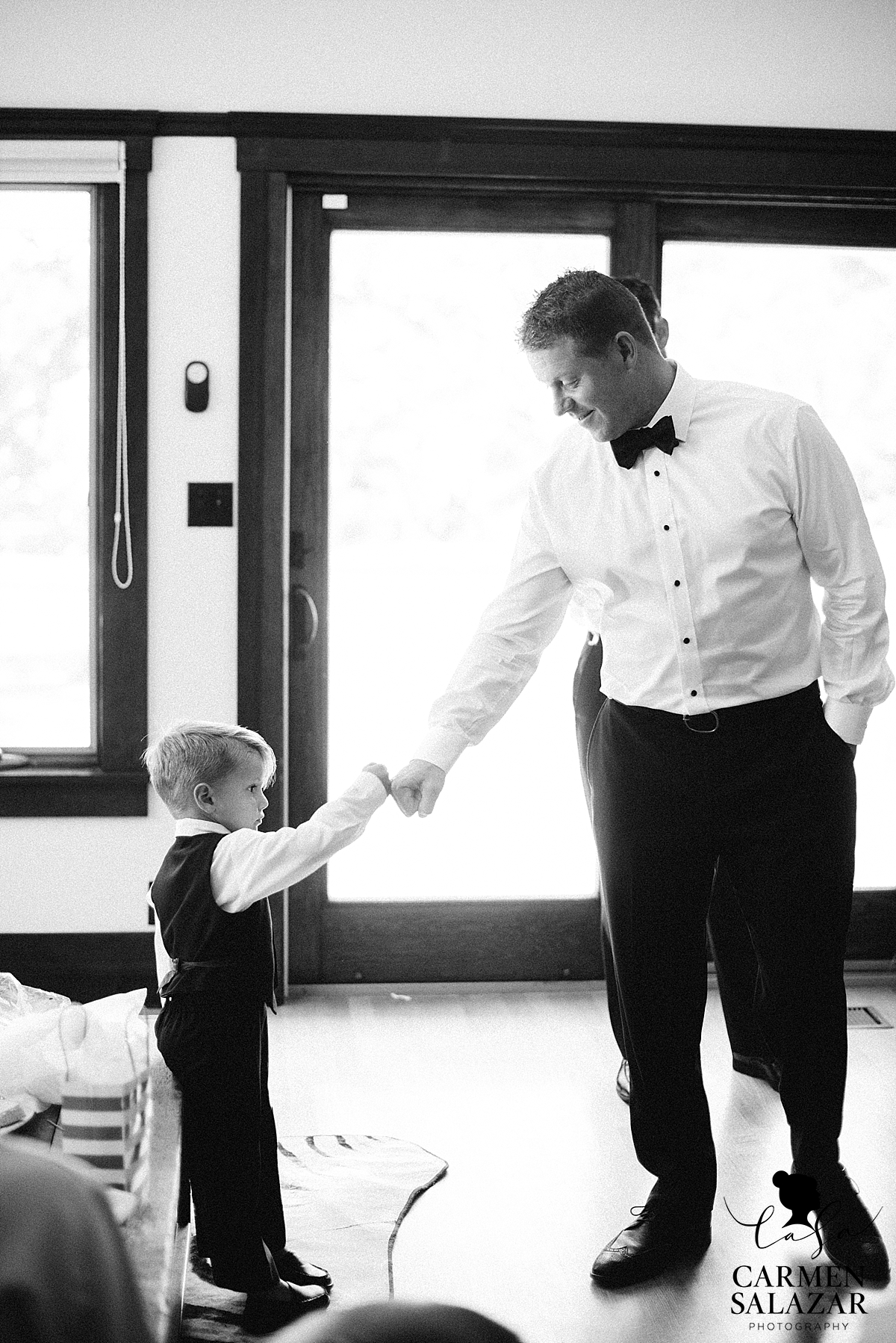 Sentimental groom getting ready for the wedding 