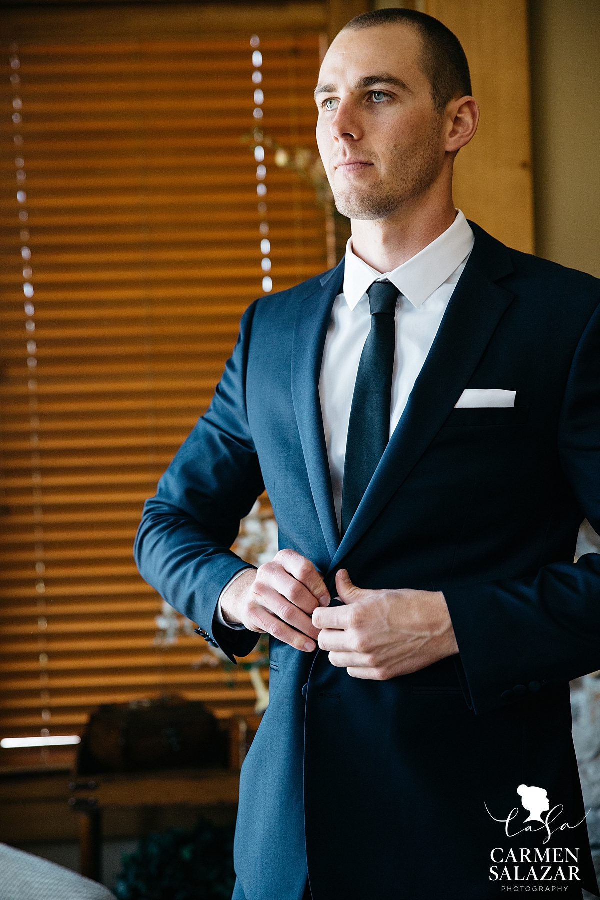 Dapper groom getting ready in Tahoe - Carmen Salazar