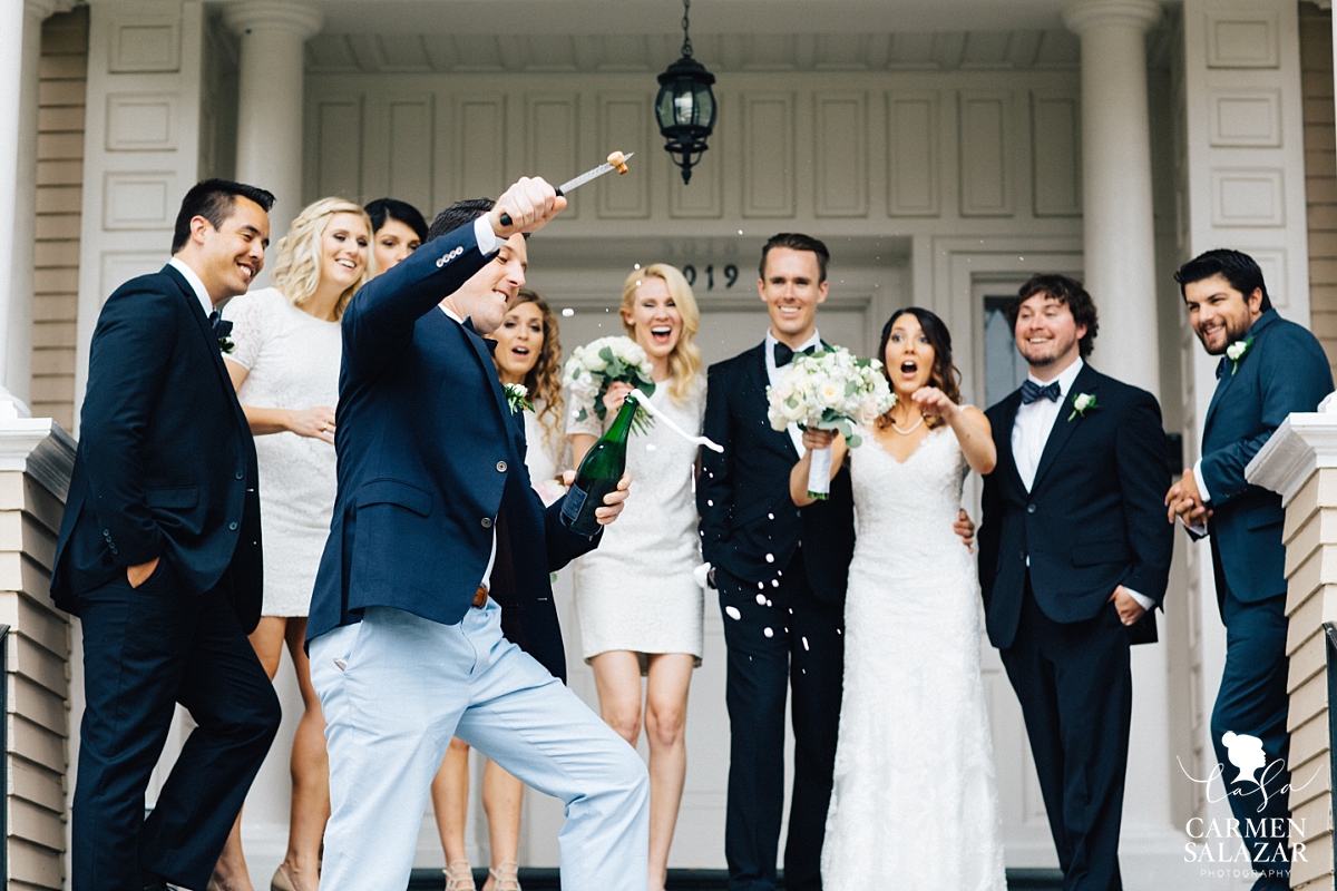 Popping champagne for the newlyweds - Carmen Salazar