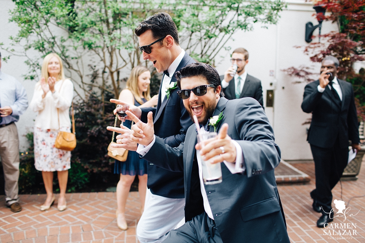 fun groomsmen entrance at cocktail hour