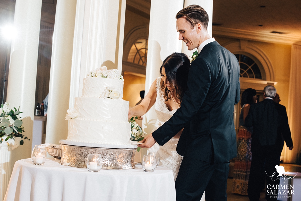 Bride and groom cutting cake at Vizcaya - Carmen Salazar