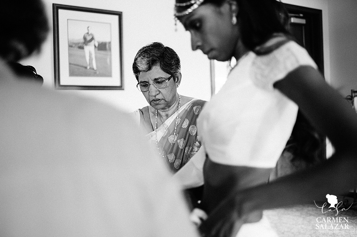 Indian family dressing bride at country club wedding - Carmen Salazar