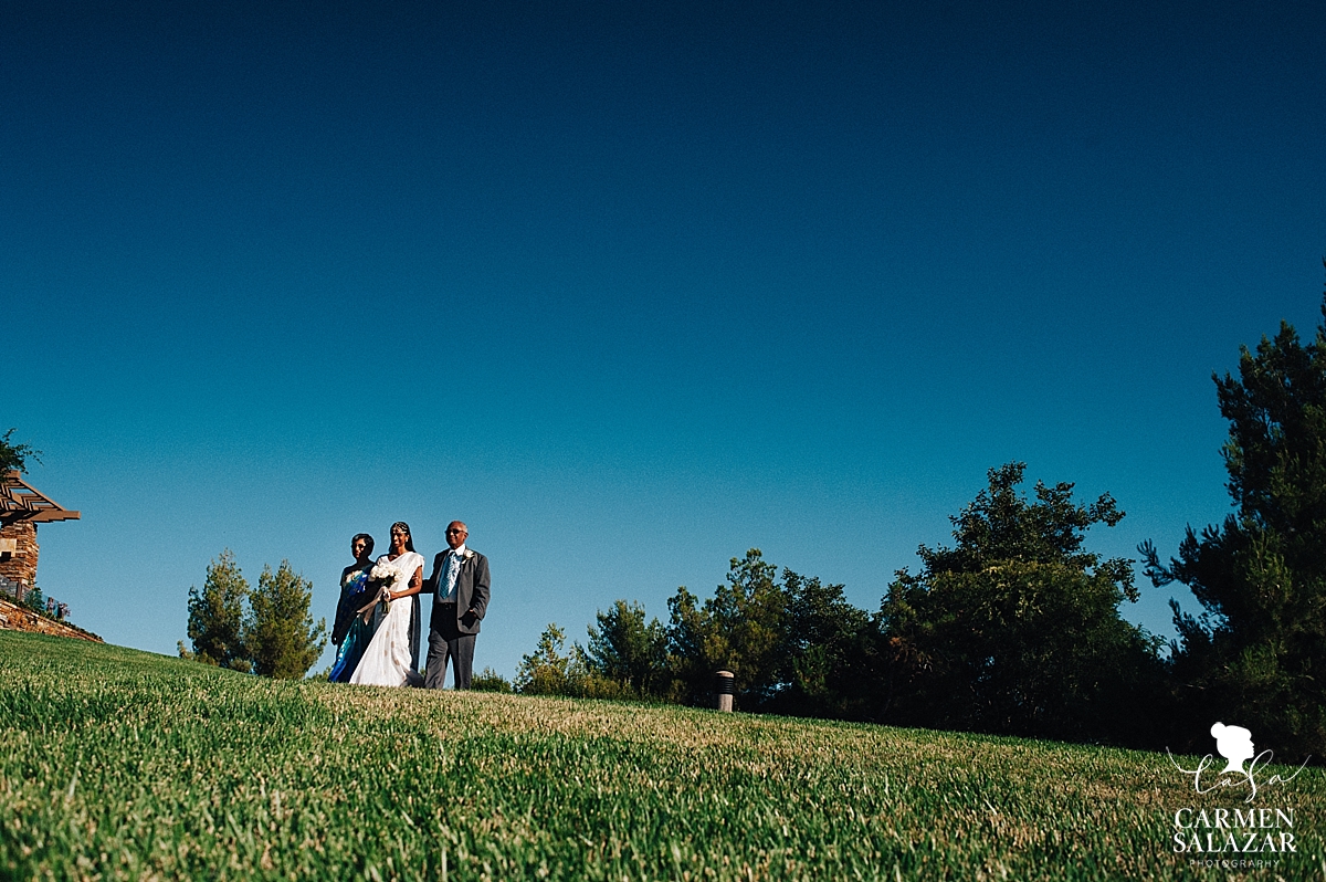 Beautiful Indian bride walking the aisle - Carmen Salazar