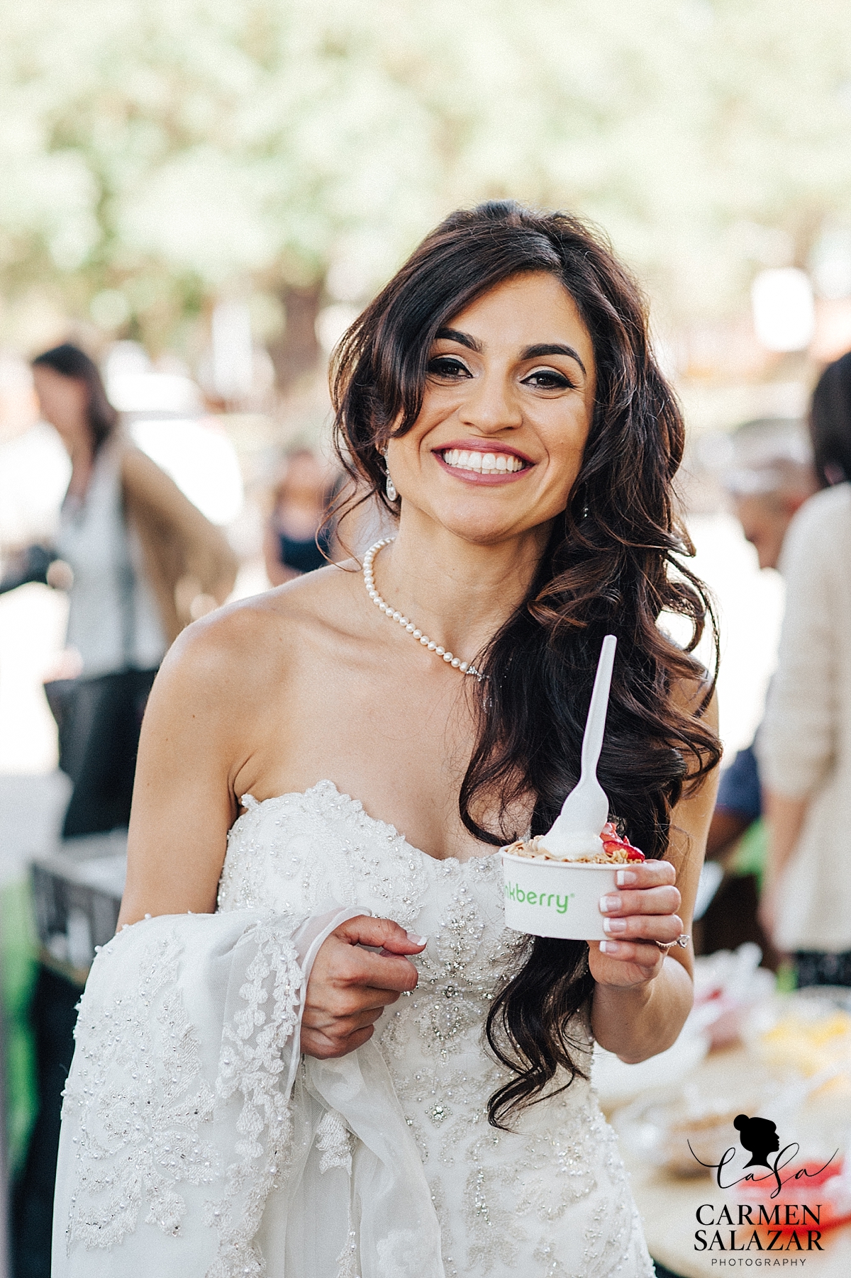 Smiling bride with Pinkberry yogurt - Carmen Salazar