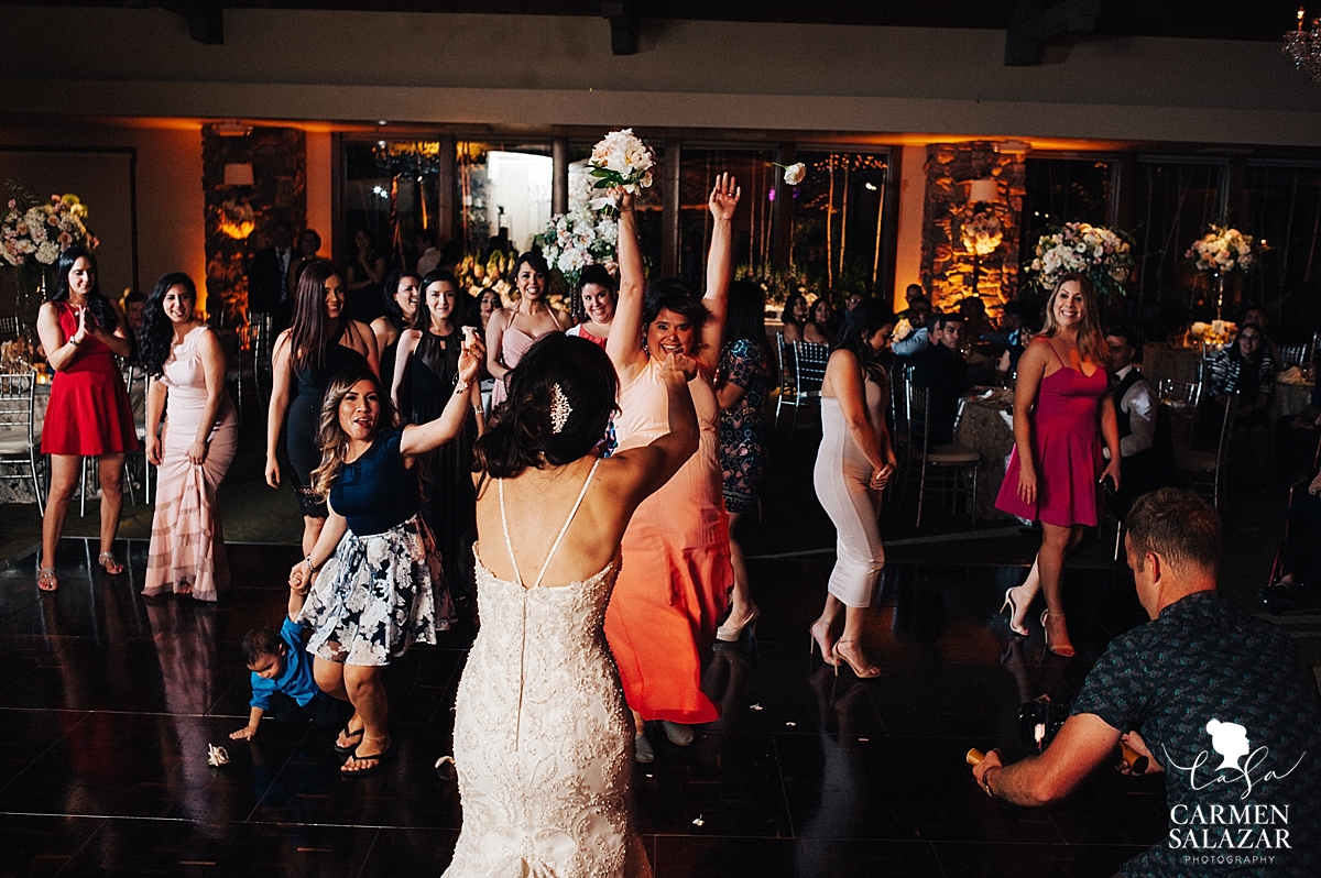 Bouquet toss at Lodi ballroom wedding reception - Carmen Salazar