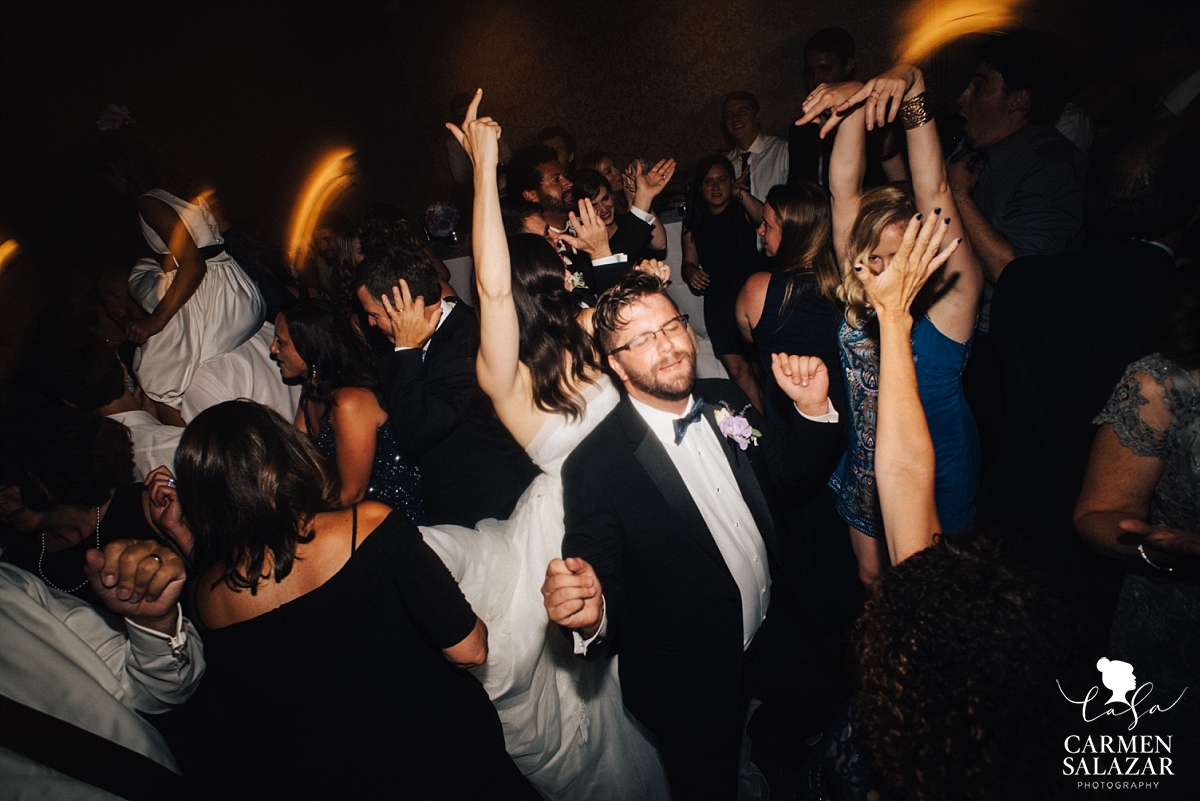 Groomsman dancing silly at Westin - Carmen Salazar