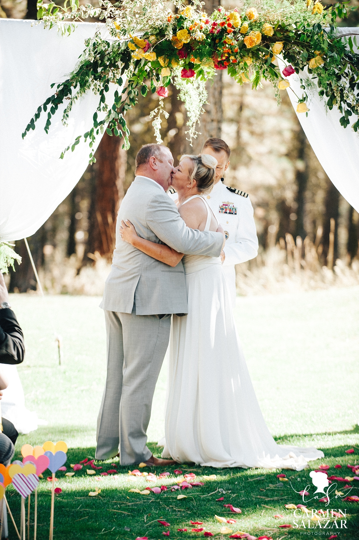 First kiss at Chalet View Lodge fall wedding - Carmen Salazar