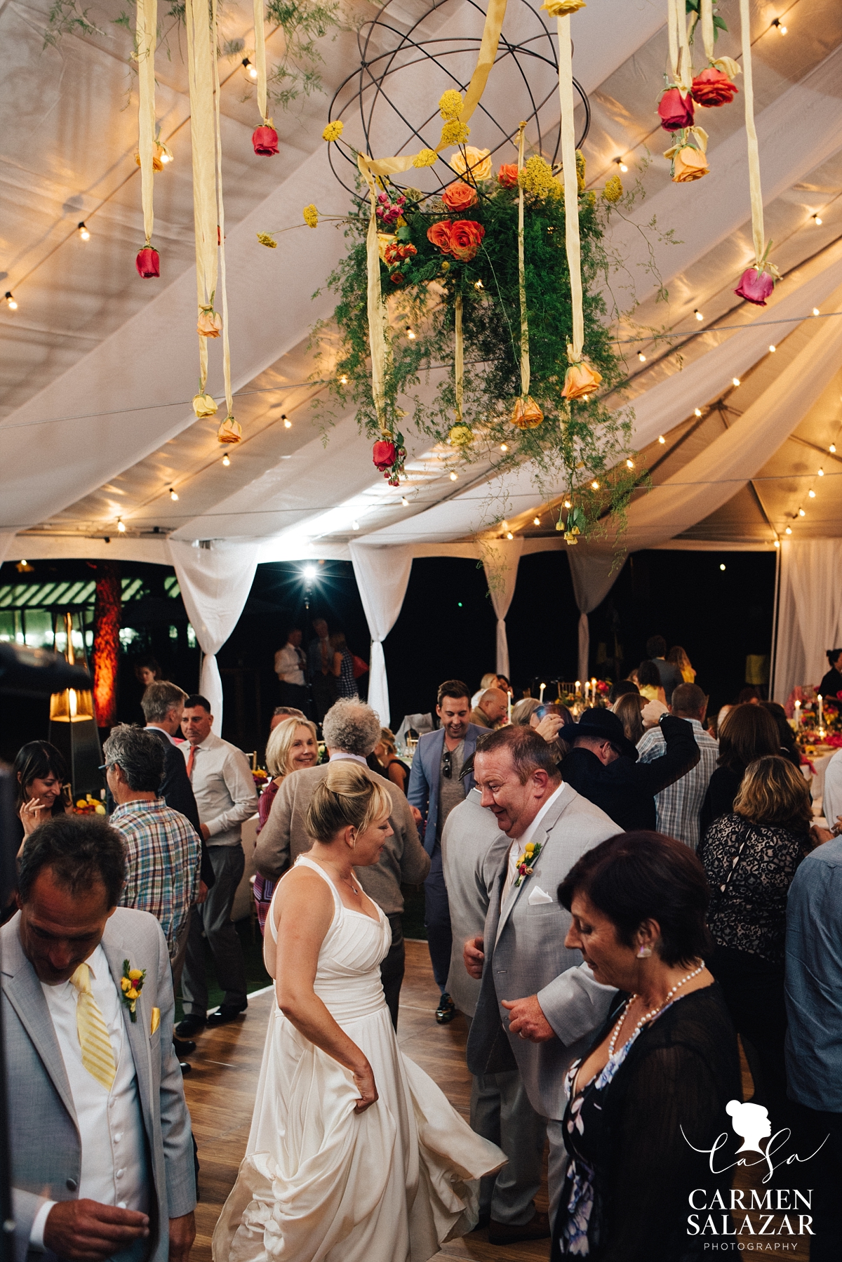 Bride and groom on the dance floor at Chalet View Lodge - Carmen Salazar