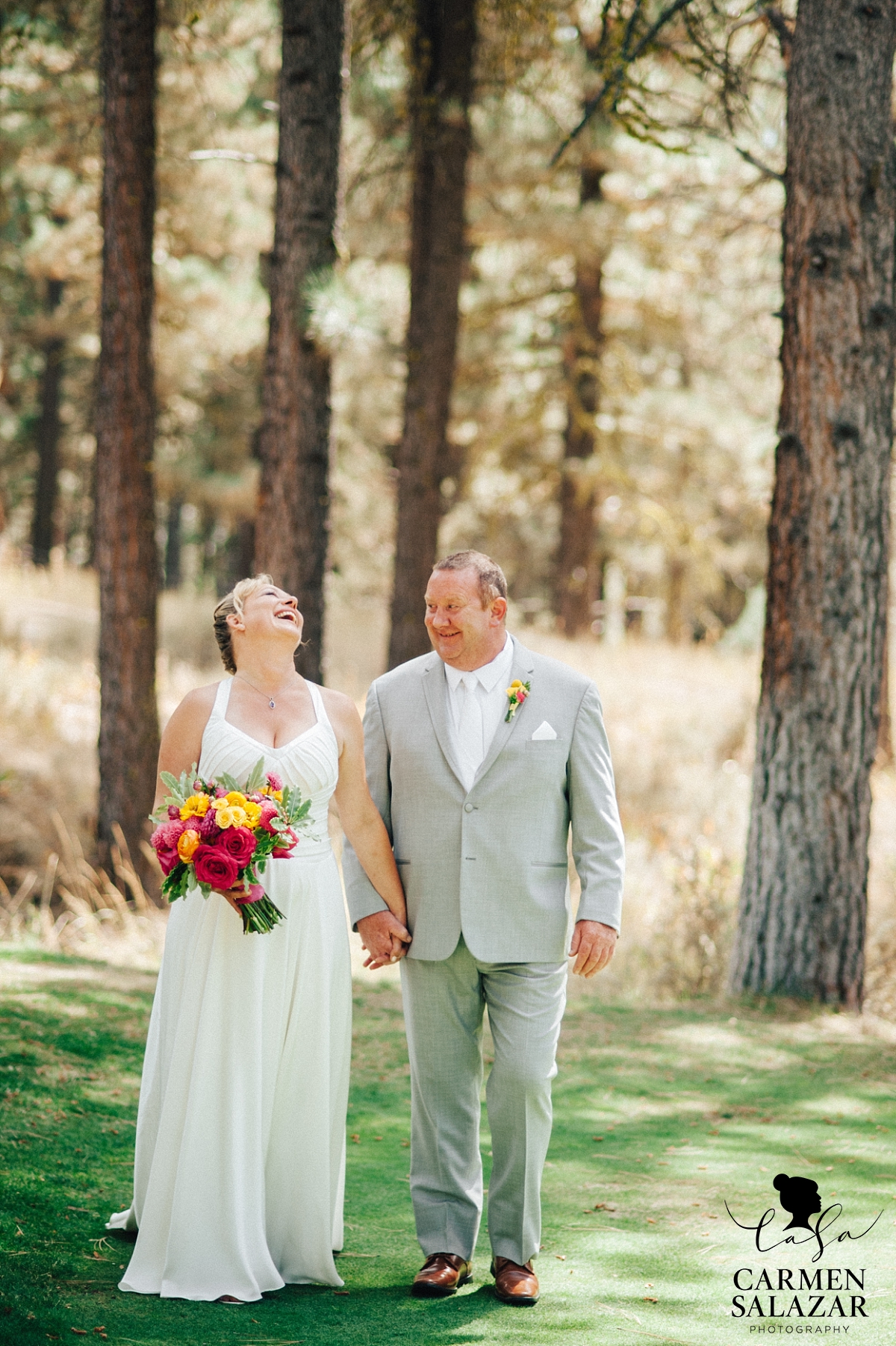 Bride and groom laughing at Tahoe ceremony - Carmen Salazar