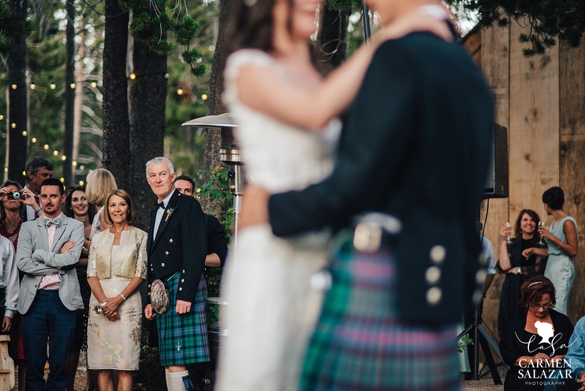 Wedding guests watching first dance - Carmen Salazar