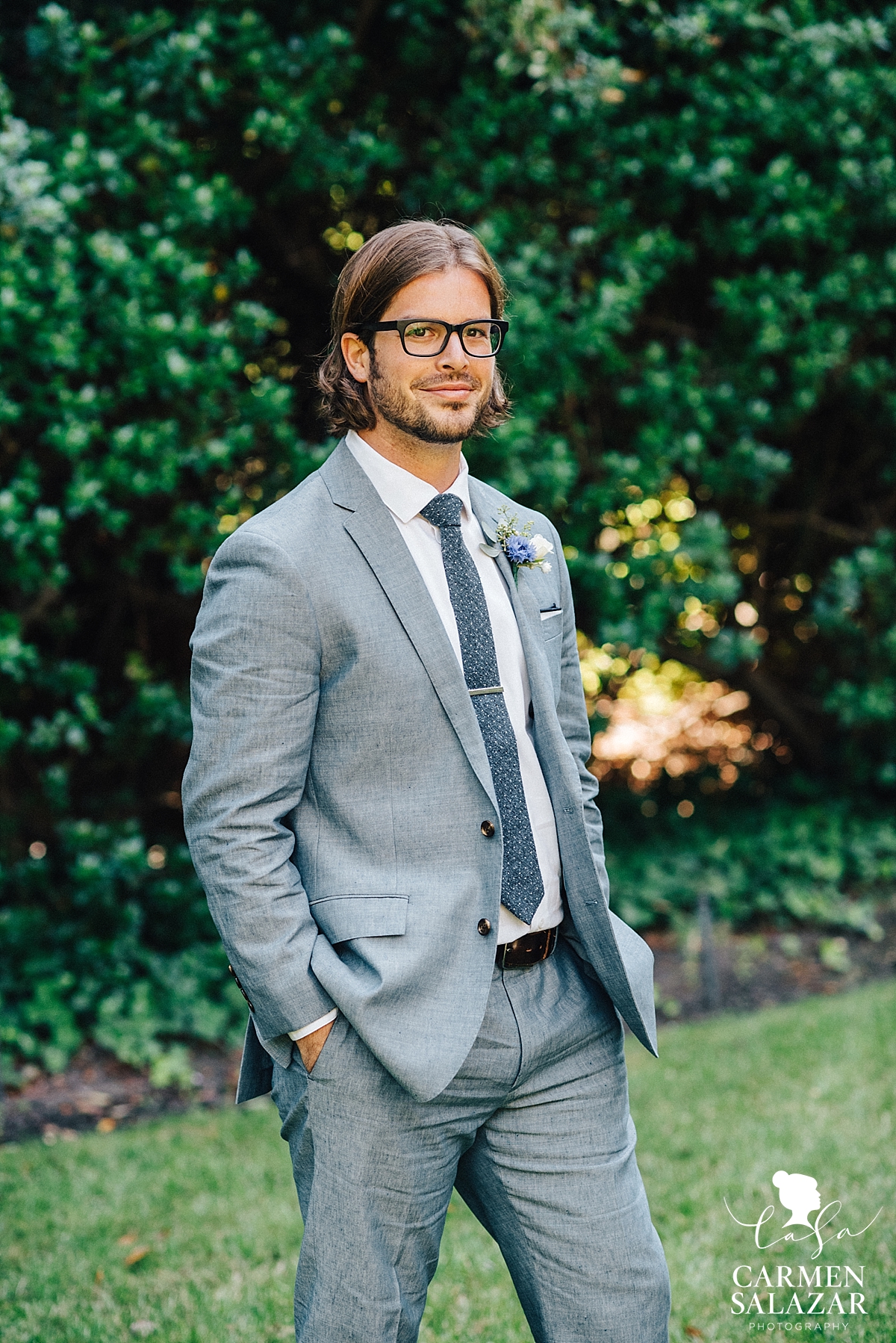 Dapper groom waiting for the first look - Carmen Salazar