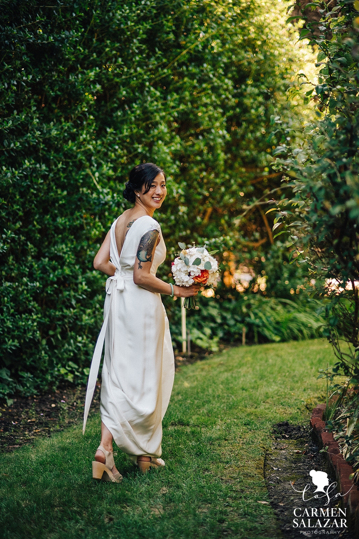 Happy bride leaving for outdoor ceremony - Carmen Salazar