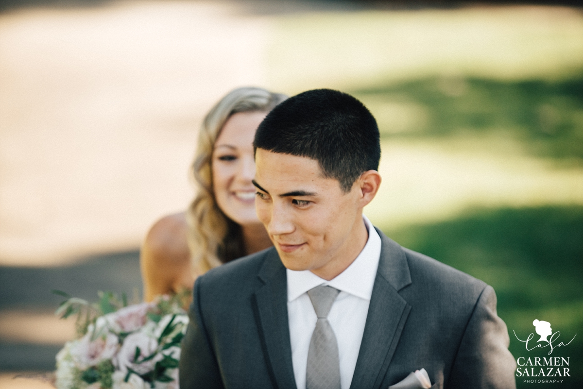 Grinning bride and groom at first look portraits - Carmen Salazar