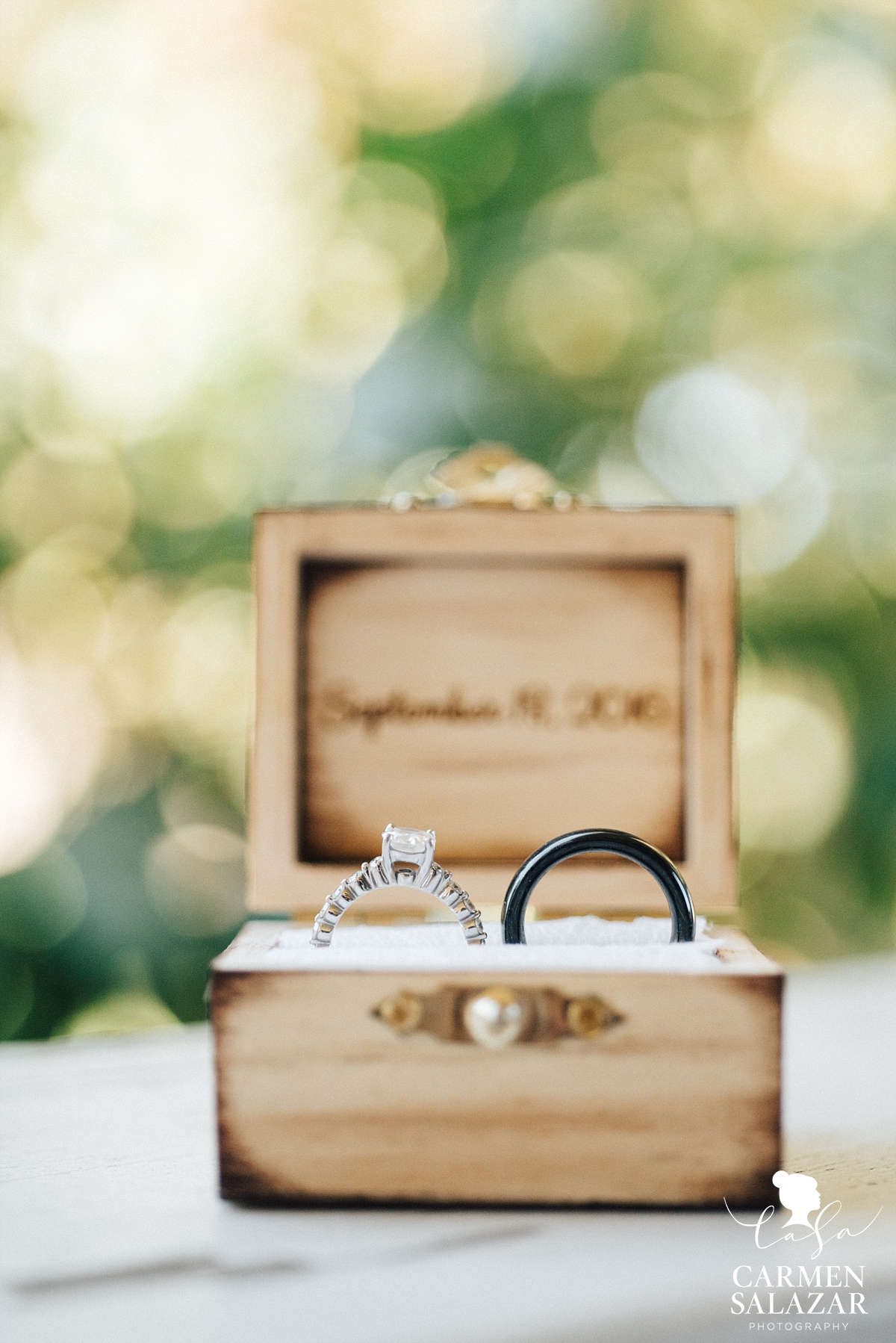 Modern wedding rings in personalized wood ring box - Carmen Salazar