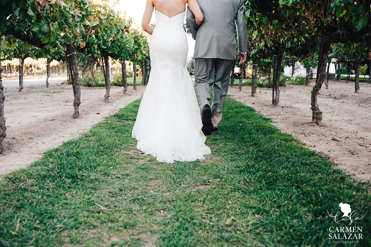 Bride walking down the aisle at Scribner Bend summer wedding - Carmen Salazar