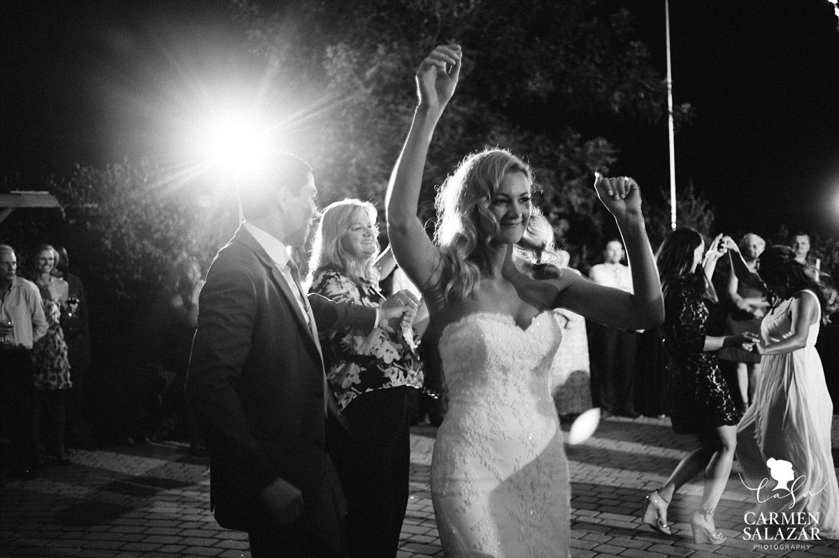 Bride dancing at Scribner Bend Vineyards - Carmen Salazar