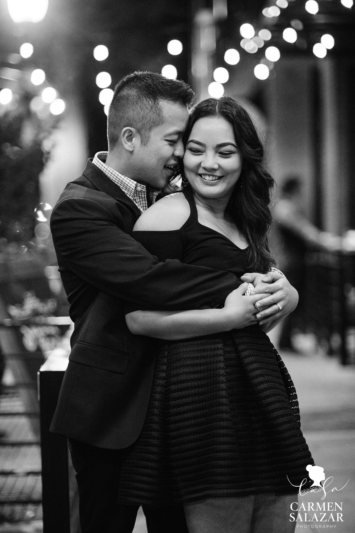 Romantic night city lights engagement - Carmen Salazar