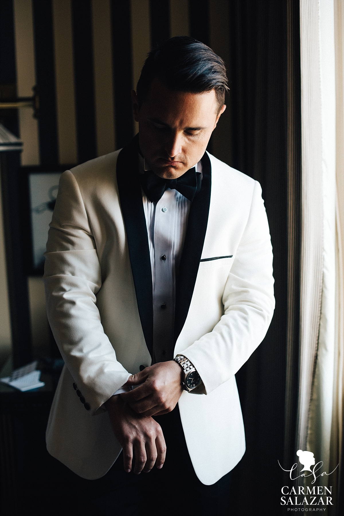 Dapper white tuxedo groom style - Carmen Salazar