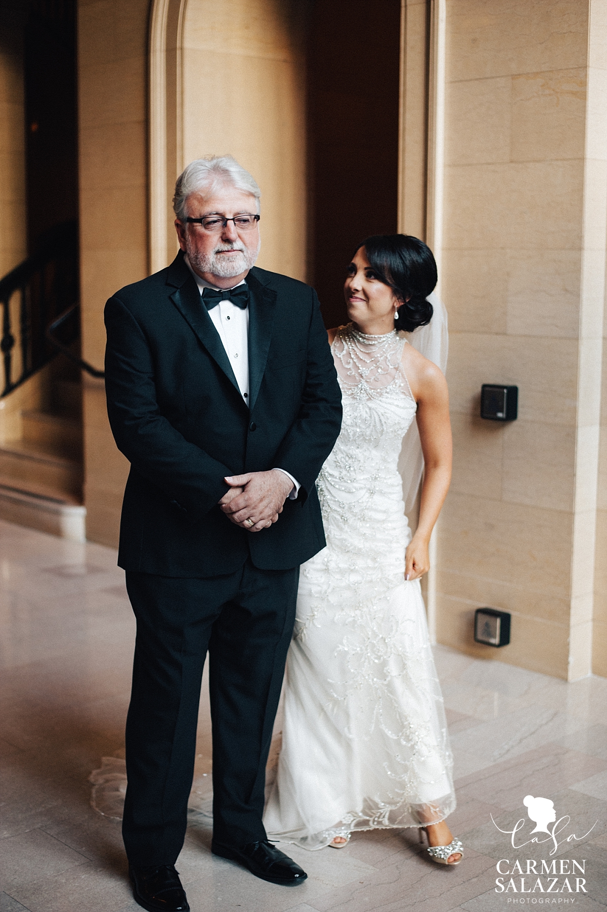 Father of the bride first look in Citizen lobby - Carmen Salazar