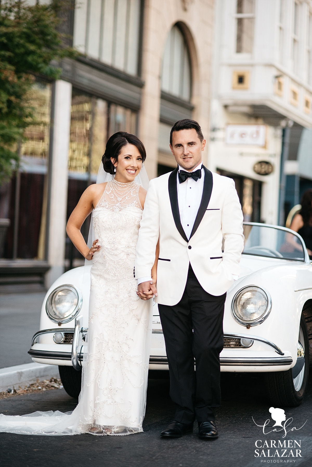 Classic style bride and groom with Porsche - Carmen Salazar