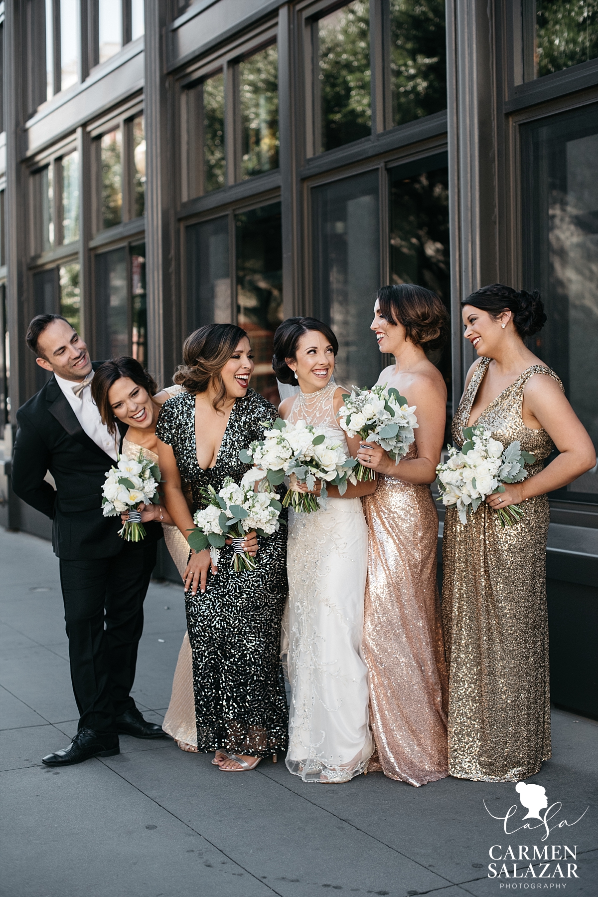 Playful bridal party photos in front of The Grange - Carmen Salazar