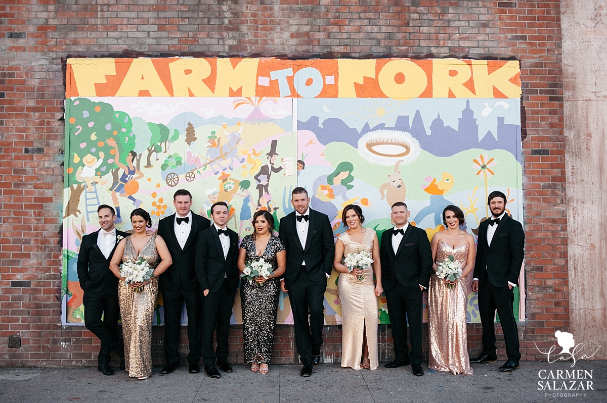 Colorful bridal party portraits with urban mural - Carmen Salazar