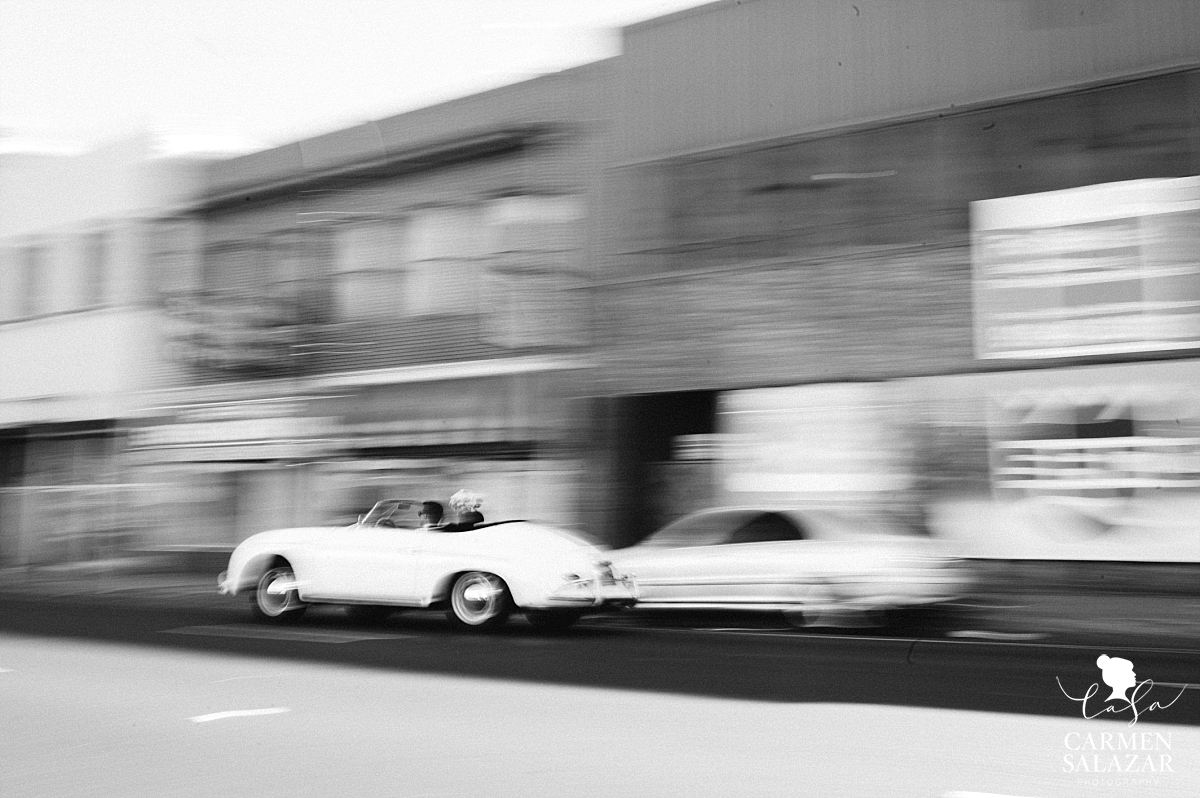 Bride and groom zooming away to wedding ceremony - Carmen Salazar