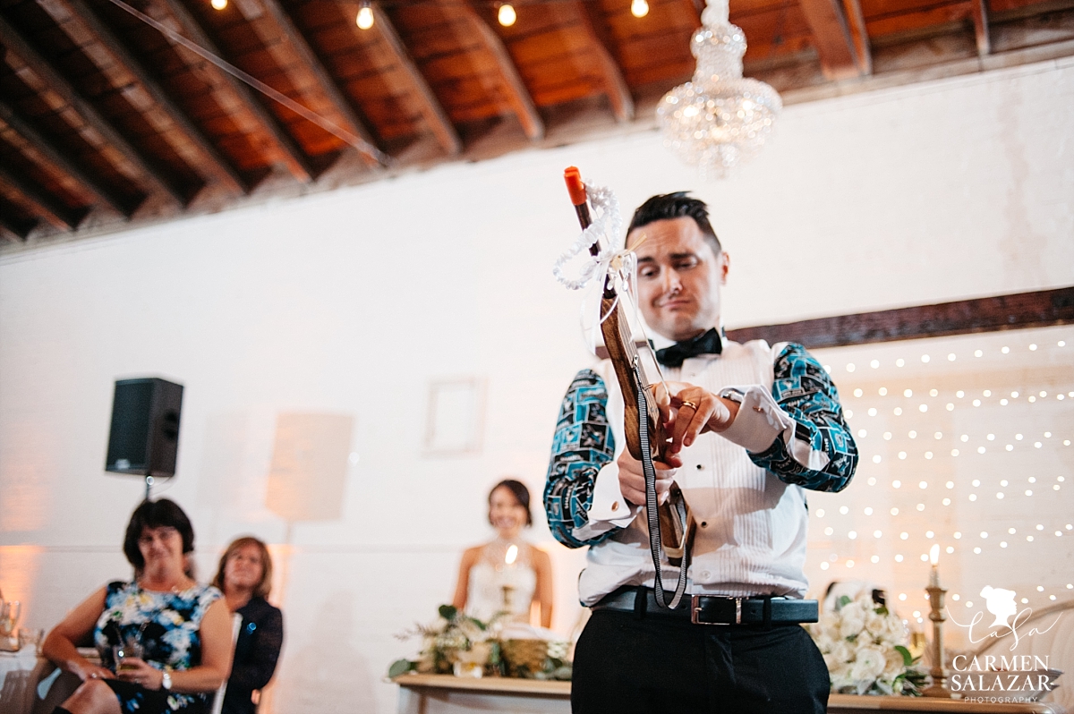 Garter toss slingshot gun at Sacramento wedding reception - Carmen Salazar