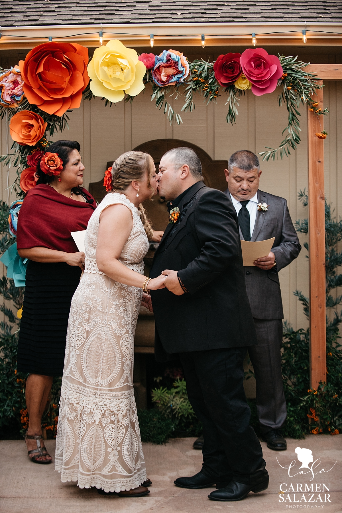 First kiss at Mexican private estate wedding ceremony - Carmen Salazar