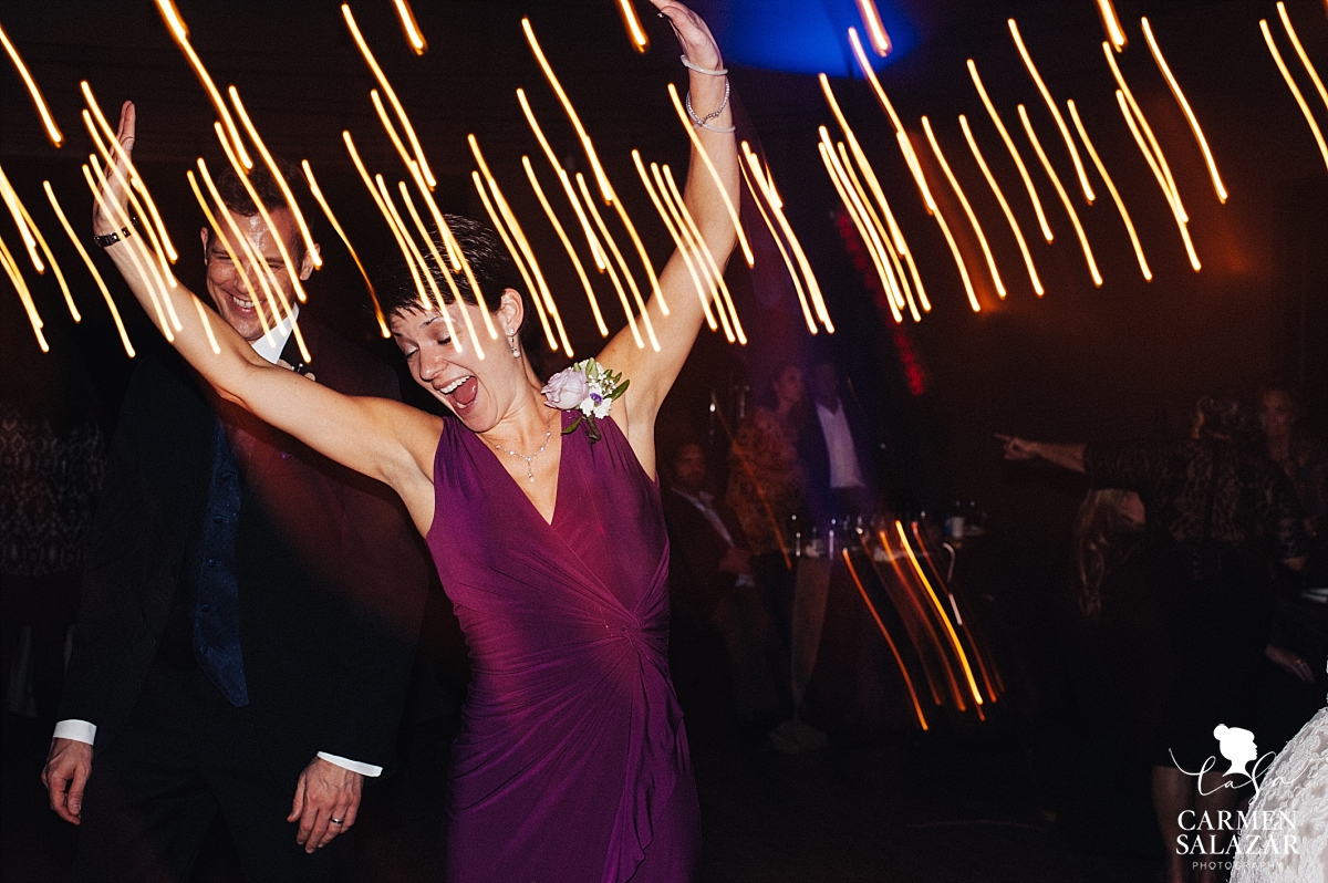 Fun light stream wedding dance floor photography - Carmen Salazar