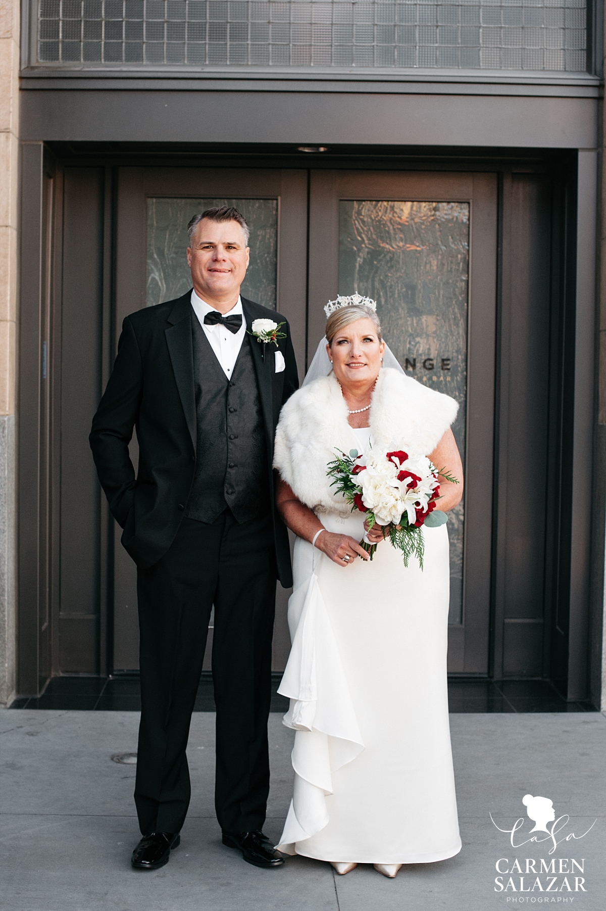 Bride and groom portraits in front of The Grange - Carmen Salazar