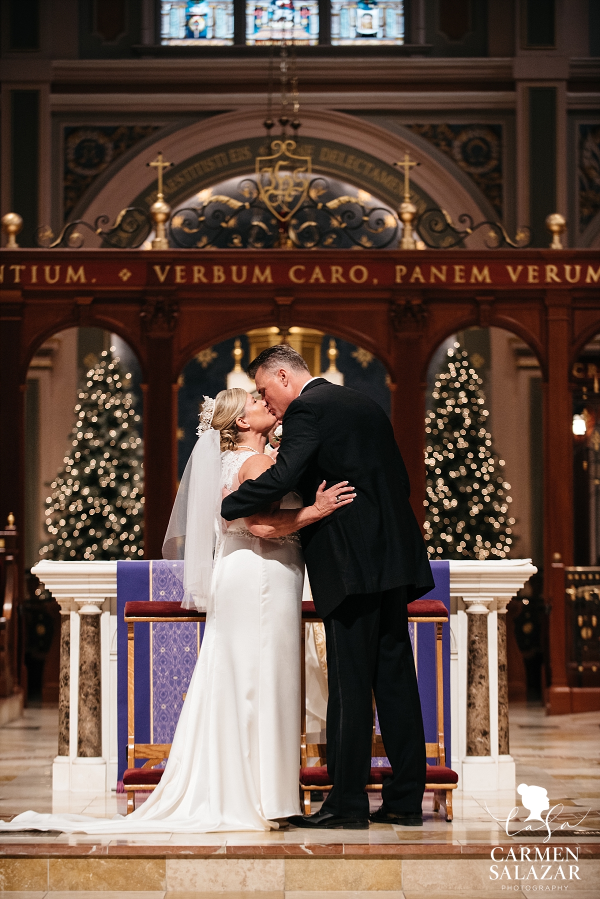 First kiss at Sacramento cathedral wedding - Carmen Salazar