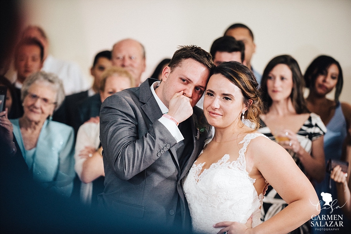 Emotional bride and groom watch performance - Carmen Salazar