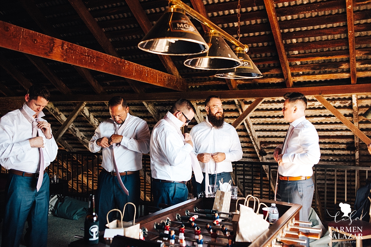 Groomsmen getting ready in barn loft - Carmen Salazar 