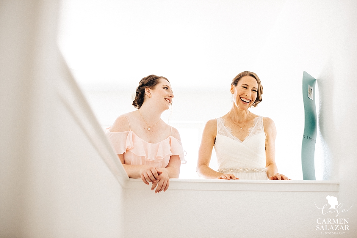 Beaming bride getting ready for ceremony - Carmen Salazar