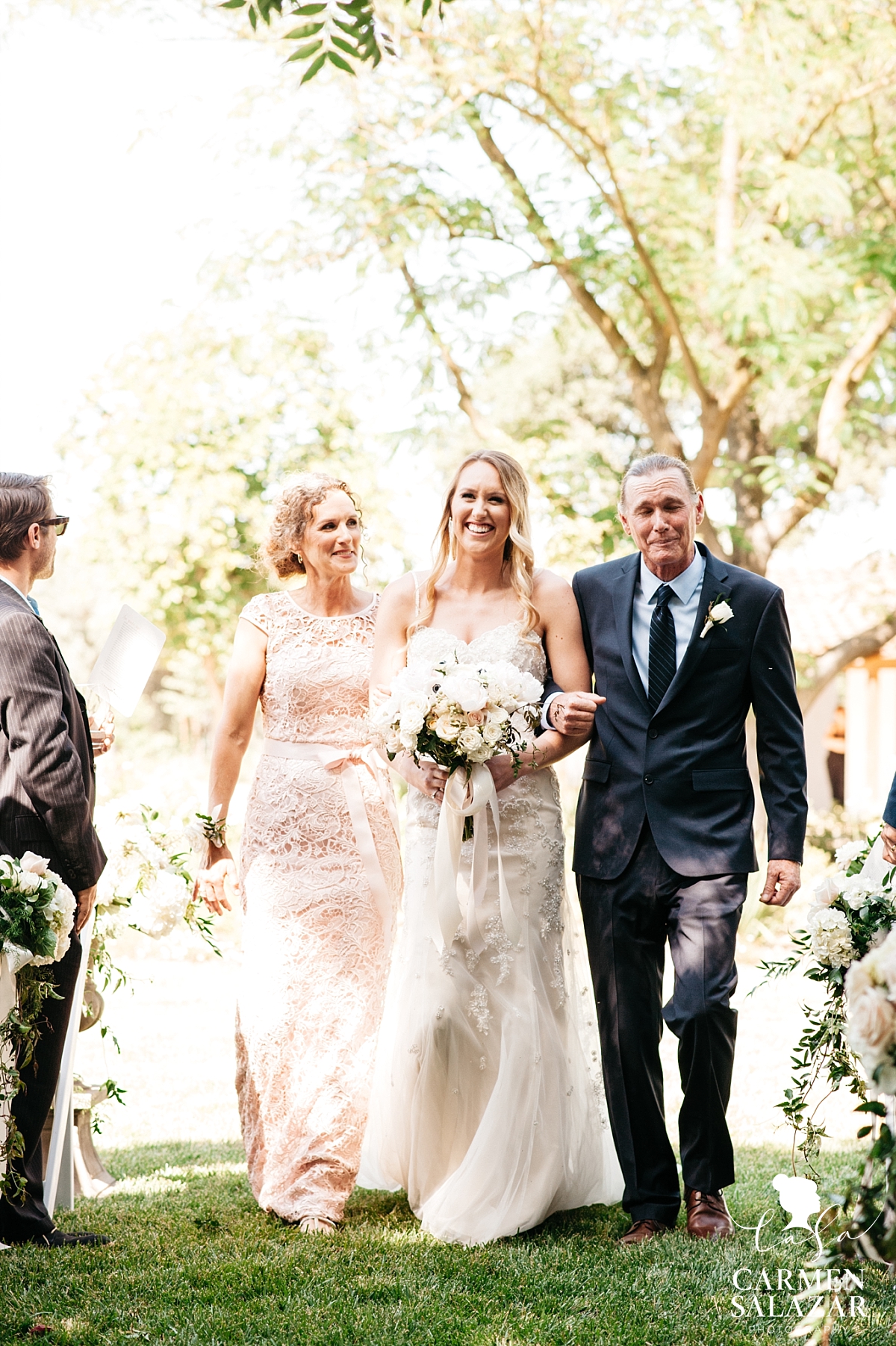 Emotional bride and parents walk the aisle - Carmen Salazar