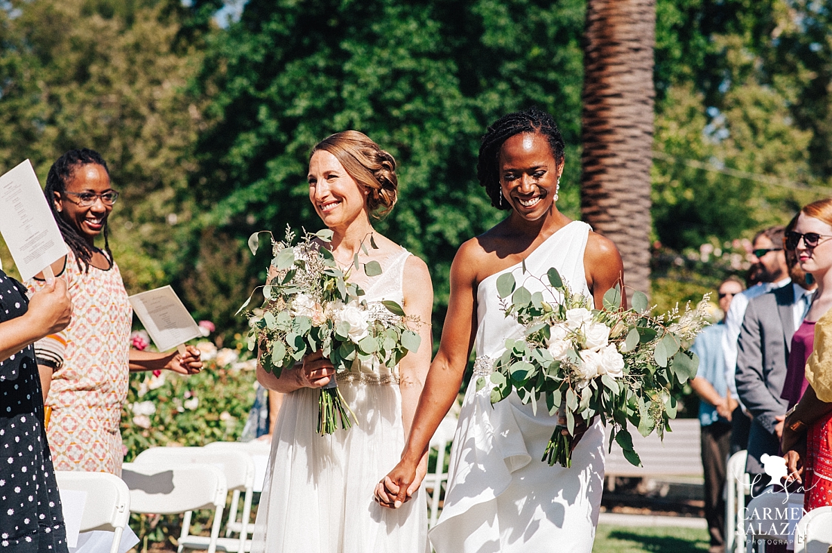 Two brides walk the aisle at McKinley Rose Garden - Carmen Salazar