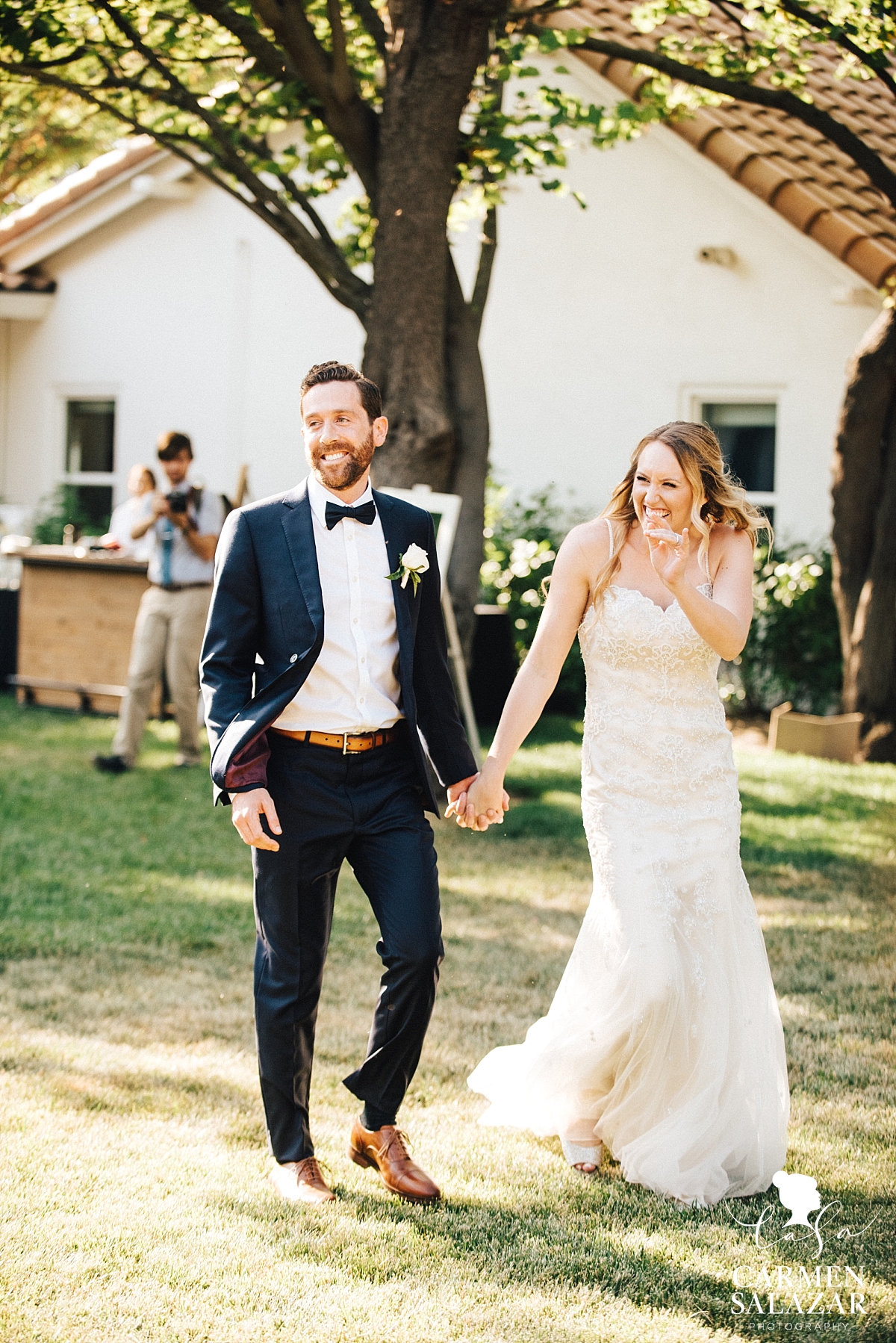 Newlyweds grand entrance at Maples - Carmen Salazar