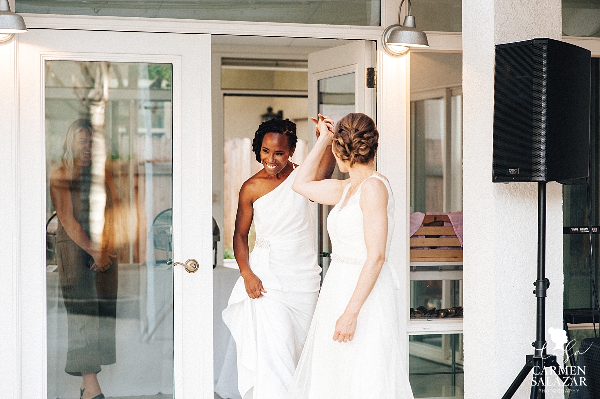 Two brides grand entrance into reception - Carmen Salazar