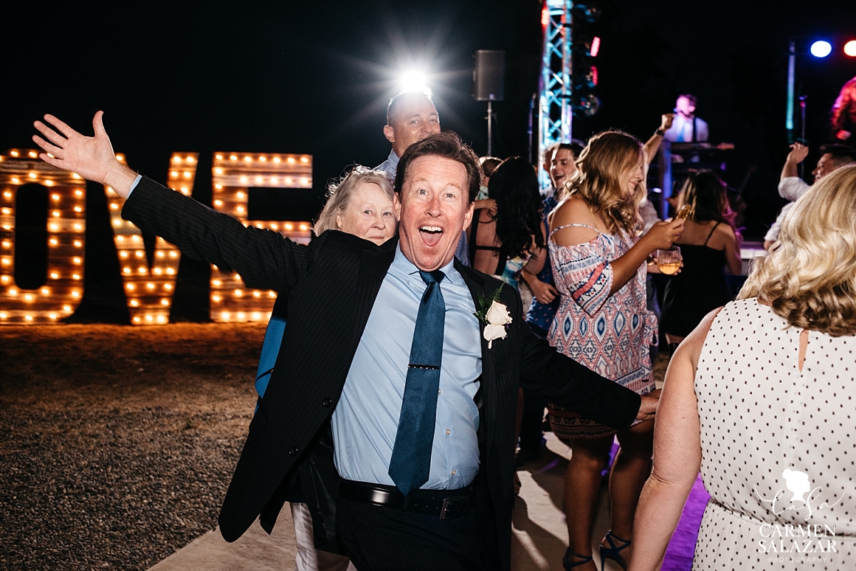 Happy dad on the wedding dance floor - Carmen Salazar 