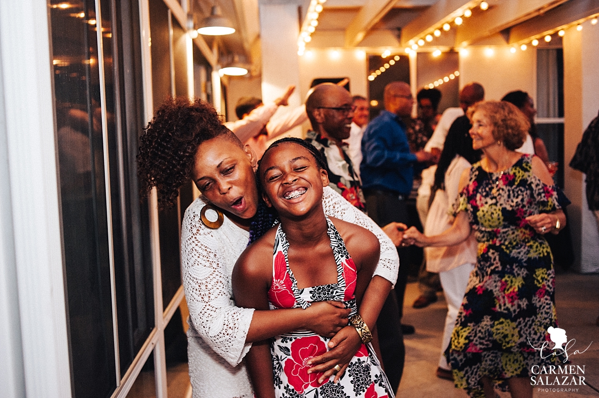 Family having fun on the wedding dance floor - Carmen Salazar